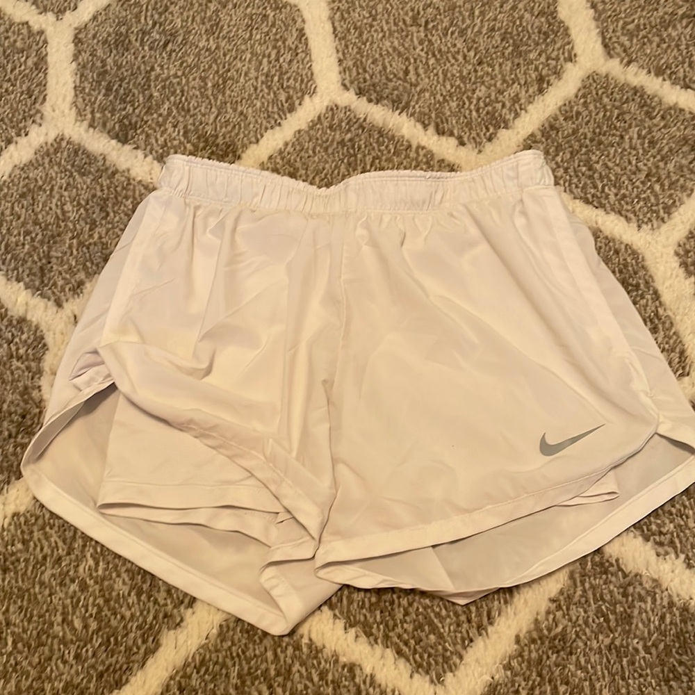 White Nike running shorts with spandex underneath
